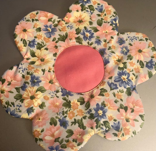 Set of LW Designs coasters with decorative patterns, placed on a wooden table, showcasing their stylish design and craftsmanship.