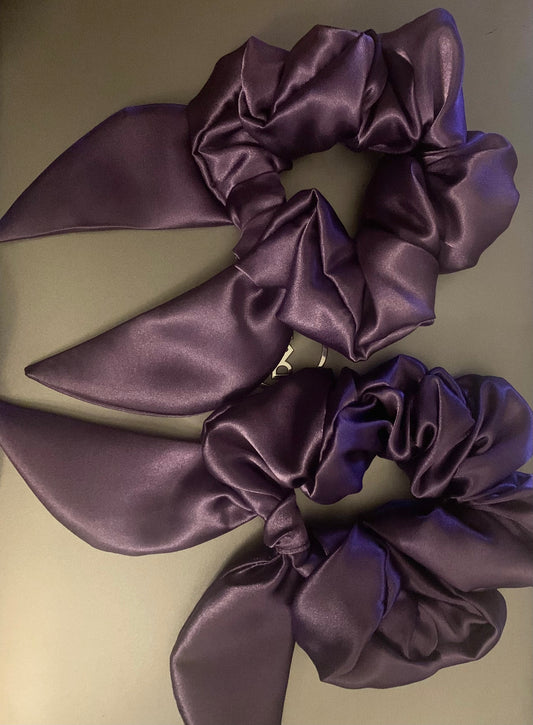 LW Designs hair scrunchies in various colors, soft fabric with elastic bands, displayed on a neutral background.
