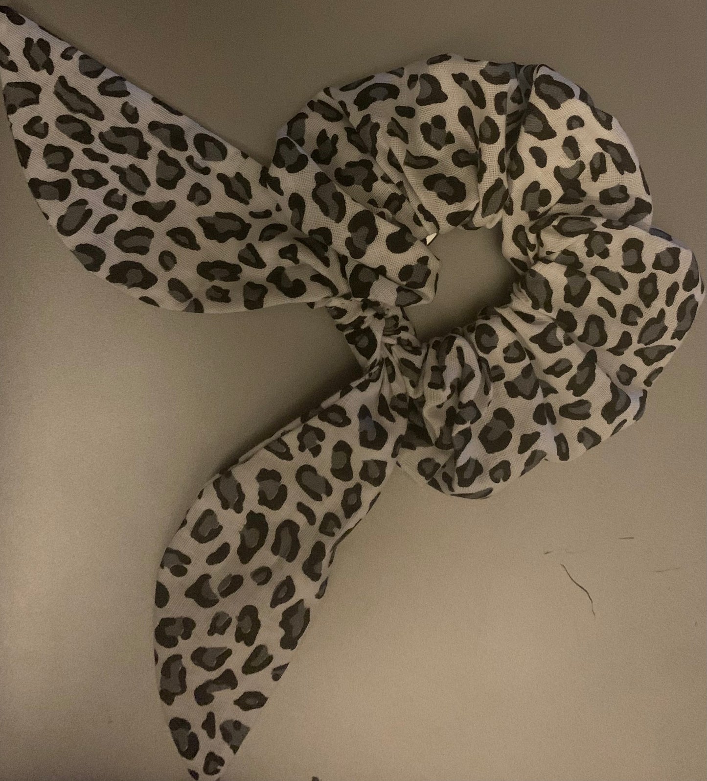 LW Designs hair scrunchies in various colors, made of soft fabric, suitable for casual or stylish hair styling.