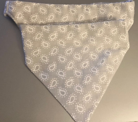 Pet bandana from LW Designs featuring colorful, stylish fabric tied around a dog's neck.