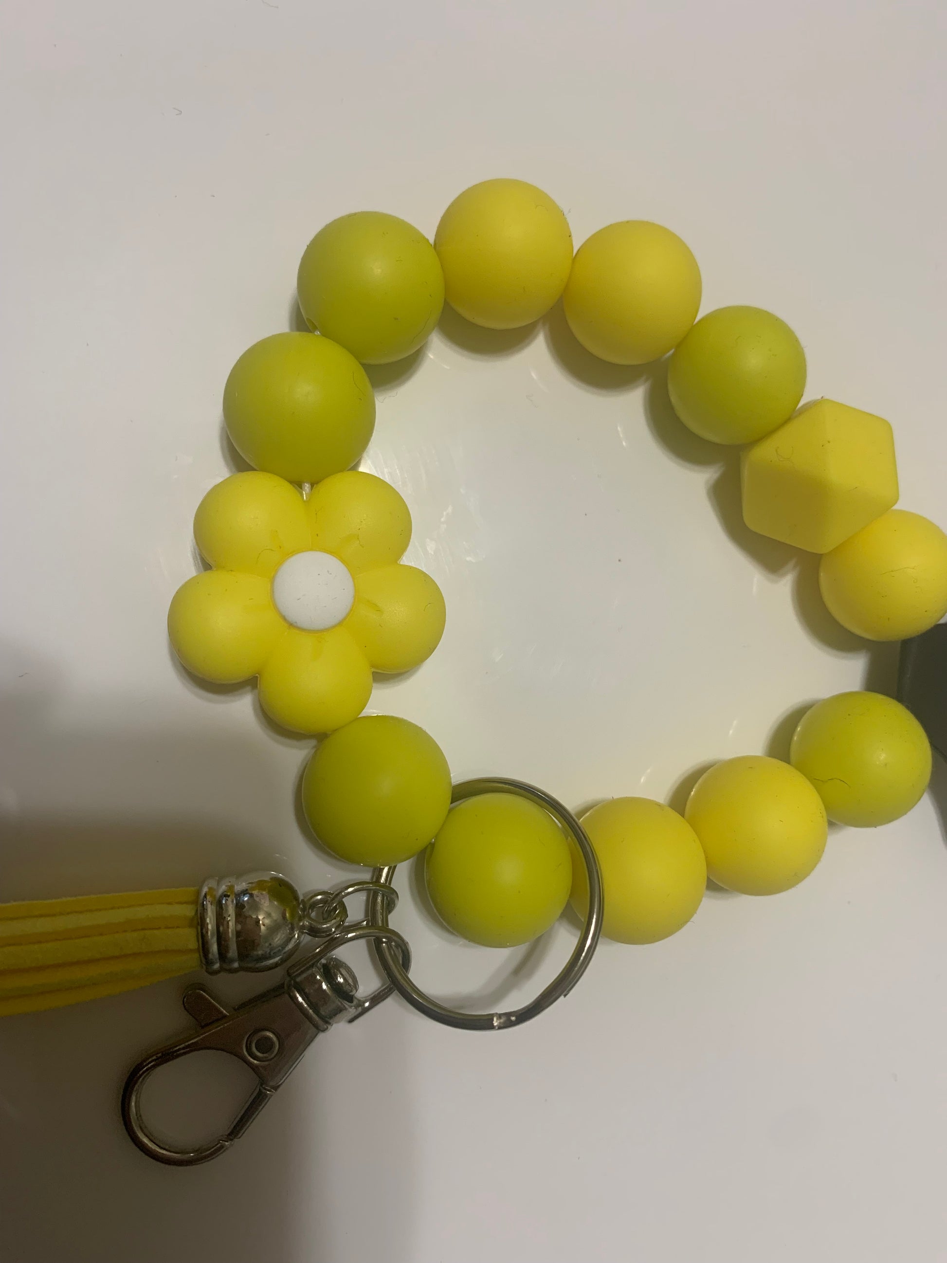 Beaded wristlet keychain from LW Designs with colorful beads and decorative charm, ideal for accessories or key organization.