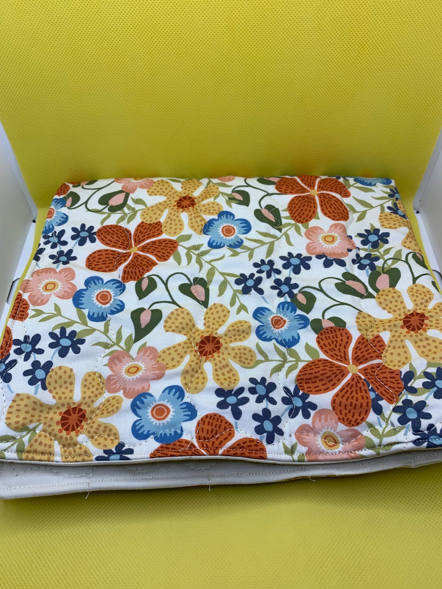 LW Designs quilted oversized hot pads with a soft, padded surface and durable quilted pattern for heat protection.