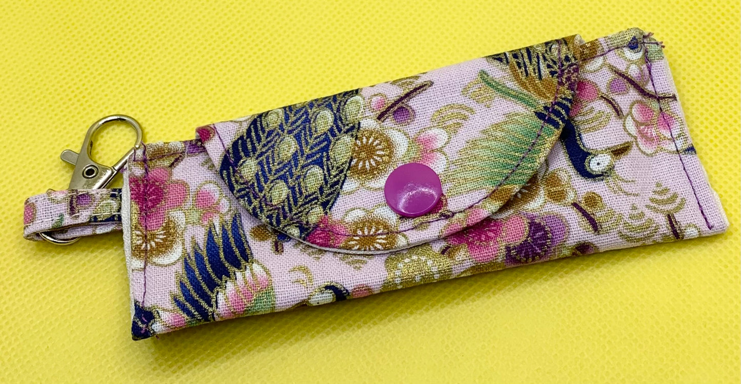 LW Designs lip balm holder with keychain attachment, compact and convenient for carrying lipstick or chapstick on the go.