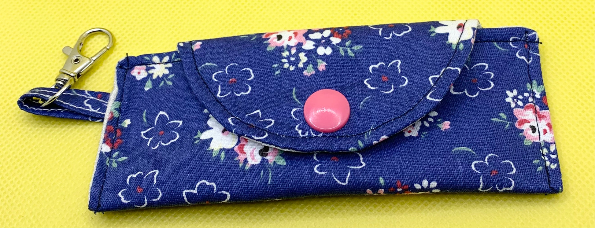 LW Designs lip balm holder with keychain attachment, compact and stylish accessory for carrying chapstick easily.