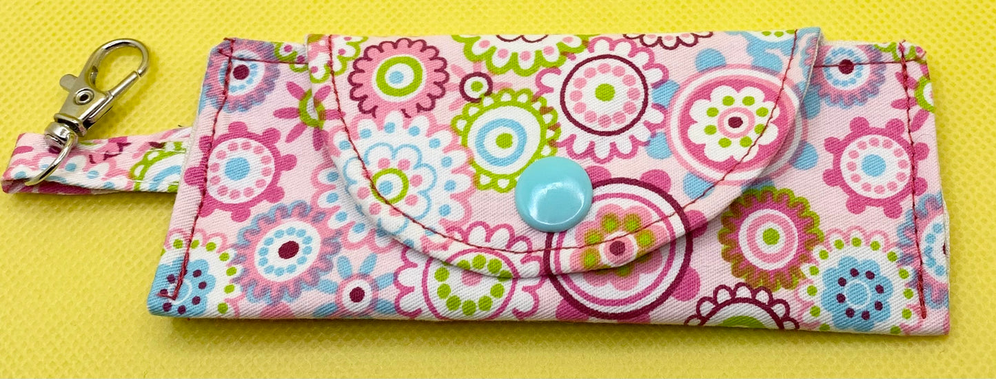 LW Designs lip balm holder with a colorful, decorative design, perfect for carrying and protecting your chapstick.